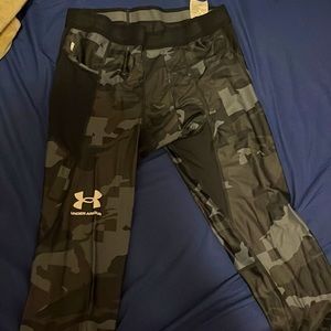 Grey and black under-armor tights